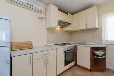 Kuhinja ili čajna kuhinja u objektu Bulat Sea View Apartments