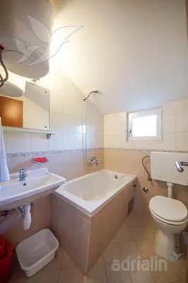 Kupaonica u objektu Apartments Zjacic