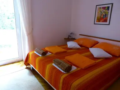Krevet ili kreveti u jedinici u objektu Apartments by the sea Pirovac, Sibenik - 13275