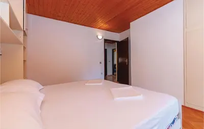 Krevet ili kreveti u jedinici u objektu Two-Bedroom Apartment In Jadrija