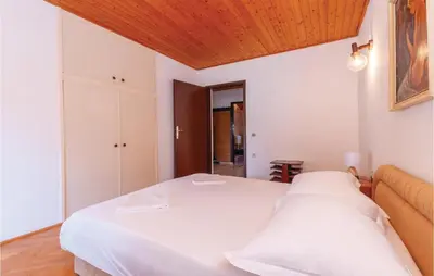 Krevet ili kreveti u jedinici u objektu Two-Bedroom Apartment In Jadrija