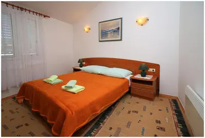 Krevet ili kreveti u jedinici u objektu Apartments by the sea Rogoznica - 1089