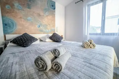 Krevet ili kreveti u jedinici u objektu Apartments Horizont
