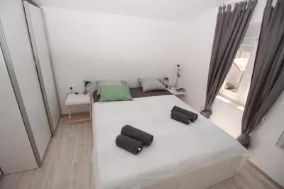 Krevet ili kreveti u jedinici u objektu Apartment Smokva ****