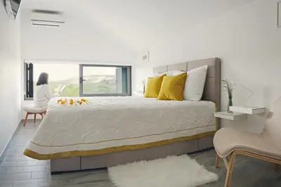 Krevet ili kreveti u jedinici u objektu Holiday House KALIMERO