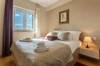 Krevet ili kreveti u jedinici u objektu Flores Luxury Suites