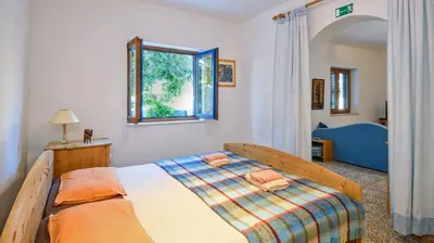 Krevet ili kreveti u jedinici u objektu Apartments Modri Dragulj
