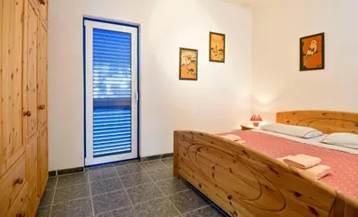Krevet ili kreveti u jedinici u objektu Apartments Modri Dragulj