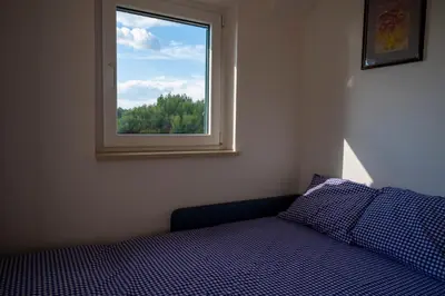 Krevet ili kreveti u jedinici u objektu Beach Apartments Marijana