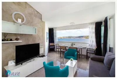 TV i/ili zabavni centar u objektu Apartments WAVE
