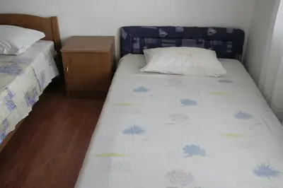 Krevet ili kreveti u jedinici u objektu Apartmani Huljev