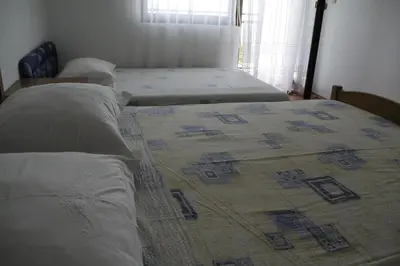 Krevet ili kreveti u jedinici u objektu Apartmani Huljev
