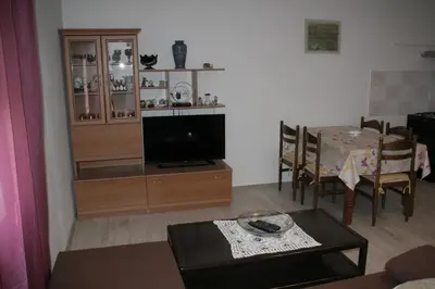 TV i/ili zabavni centar u objektu Apartmani Huljev