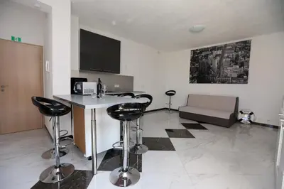 TV i/ili zabavni centar u objektu Apartmani Ivan V RELAX