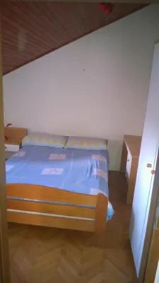 Krevet ili kreveti u jedinici u objektu Holidays Svetin Apartments
