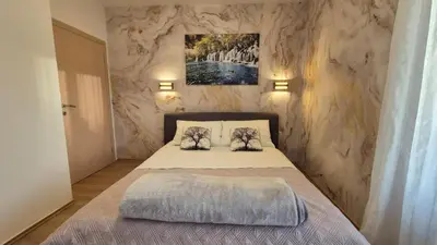 Krevet ili kreveti u jedinici u objektu Apartments Adriana