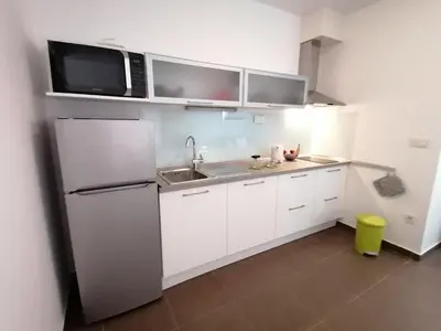 Kuhinja ili čajna kuhinja u objektu Apartment by the Beach in Dalmatia
