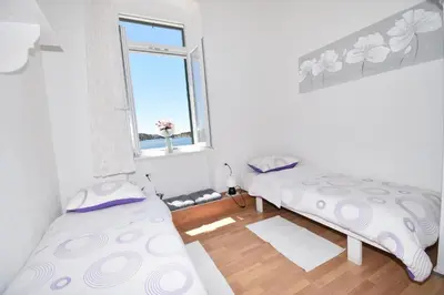 Krevet ili kreveti u jedinici u objektu Apartmani Rina