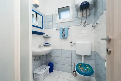 Kupaonica u objektu Apartments Hrvatic