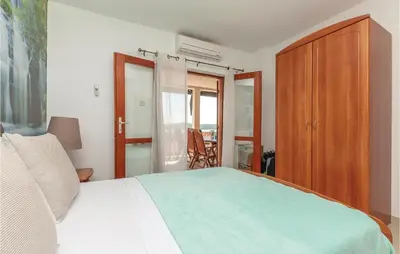 Krevet ili kreveti u jedinici u objektu Two-Bedroom Apartment In Pirovac