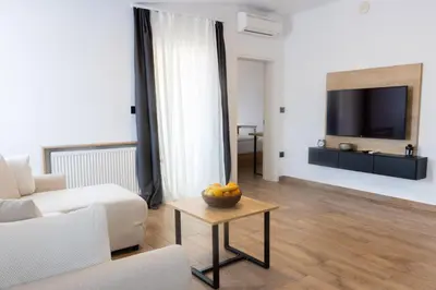 TV i/ili zabavni centar u objektu Apartments & rooms Stella Adriatica
