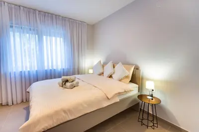 Krevet ili kreveti u jedinici u objektu Croatica Suites Brodarica