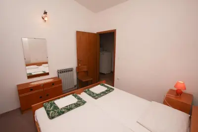 Krevet ili kreveti u jedinici u objektu Apartments and rooms Porto