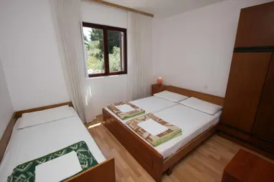Krevet ili kreveti u jedinici u objektu Apartments and rooms Porto