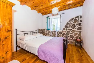 Krevet ili kreveti u jedinici u objektu Holiday Home Vlatka