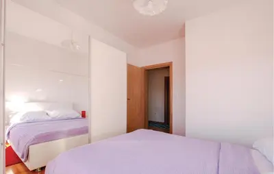 Krevet ili kreveti u jedinici u objektu Four-Bedroom Apartment In Sibenik