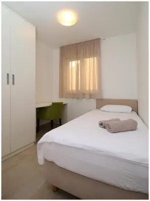 Krevet ili kreveti u jedinici u objektu Apartments Ksenia