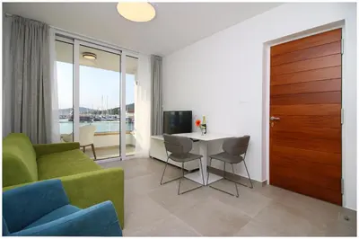 TV i/ili zabavni centar u objektu Apartments Ksenia