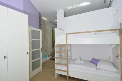 Krevet ili kreveti u jedinici u objektu Hostel Sv. Lovre