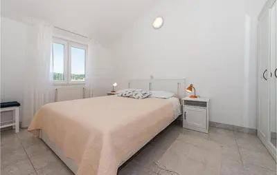 Krevet ili kreveti u jedinici u objektu One-Bedroom Apartment In Jezera