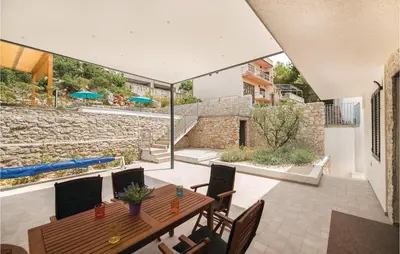 TV i/ili zabavni centar u objektu Five-Bedroom Holiday Home In Zaton