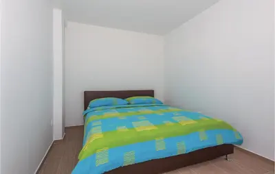 Krevet ili kreveti u jedinici u objektu Five-Bedroom Holiday Home In Zaton
