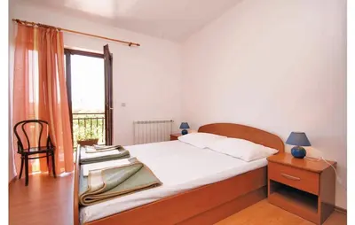 Krevet ili kreveti u jedinici u objektu Apartments Perina