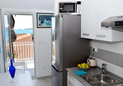 Kuhinja ili čajna kuhinja u objektu Apartmani Gloria
