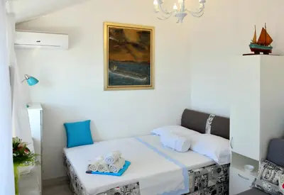 Krevet ili kreveti u jedinici u objektu Apartmani Gloria