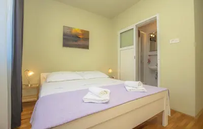 Krevet ili kreveti u jedinici u objektu Three-Bedroom Apartment In Rogoznica