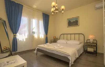 Krevet ili kreveti u jedinici u objektu Three-Bedroom Apartment In Rogoznica
