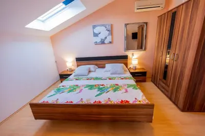 Krevet ili kreveti u jedinici u objektu Apartmani-Finka