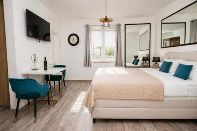 Krevet ili kreveti u jedinici u objektu Central Park Suites
