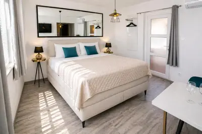 Krevet ili kreveti u jedinici u objektu Central Park Suites