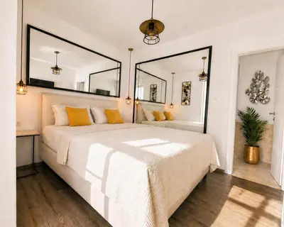 Krevet ili kreveti u jedinici u objektu Central Park Suites