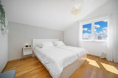 Krevet ili kreveti u jedinici u objektu Family Petrov Apartments