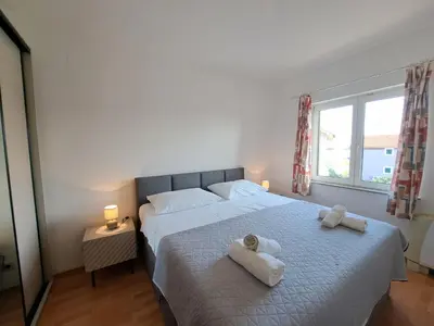 Krevet ili kreveti u jedinici u objektu Apartments Karmen