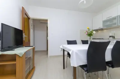 TV i/ili zabavni centar u objektu Apartments Karmela