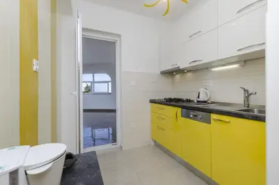 Kuhinja ili čajna kuhinja u objektu Apartments Karmela