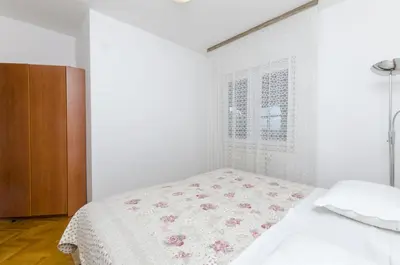 Krevet ili kreveti u jedinici u objektu Apartments Karmela